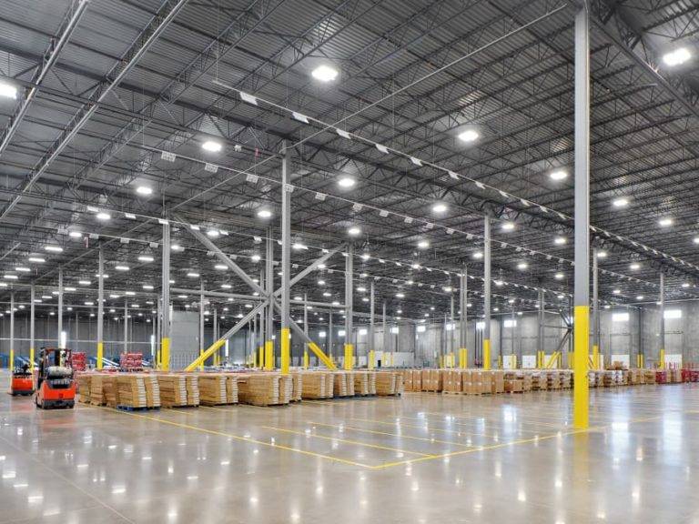 Large Warehouse Full Of Boxes And Clean Floor Showing Distribution Markings (1)